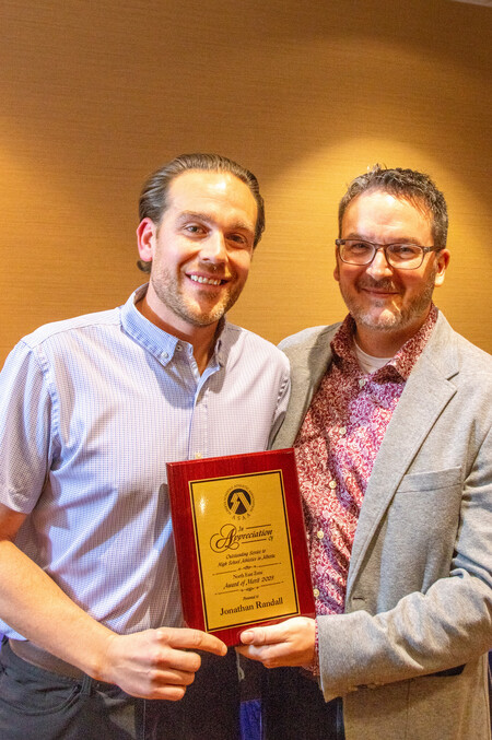 Mr. Randall receiving award with Mr. Galatiuk